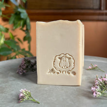 Charger l'image dans la galerie, Creamy off-white artisan soap bars with a smooth, slightly textured top edge. Each bar is embossed with a hand-stamped lamb design, adding a rustic charm. The soap has a natural, minimalist appearance, reflecting its gentle, skin-friendly ingredients.