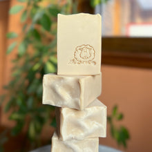 Charger l'image dans la galerie, Creamy off-white artisan soap bars with a smooth, slightly textured top edge. Each bar is embossed with a hand-stamped lamb design, adding a rustic charm. The soap has a natural, minimalist appearance, reflecting its gentle, skin-friendly ingredients.