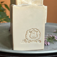 Charger l'image dans la galerie, Creamy off-white artisan soap bars with a smooth, slightly textured top edge. Each bar is embossed with a hand-stamped lamb design, adding a rustic charm. The soap has a natural, minimalist appearance, reflecting its gentle, skin-friendly ingredients.