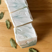 Load image into Gallery viewer, Stacked Bay Leaf & Chlorophyll Soaps, Handmade natural green bars on wood, styled with bay leaves.