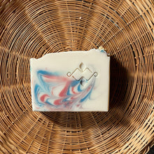 Charger l'image dans la galerie, Single jasmine flower soap with pink-blue swirls and logo emboss, flat lay view