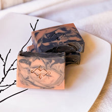 Load image into Gallery viewer, Premium natural soap bar with vibrant swirls, crafted with plant-based oils and sustainable methods by Woods and Mosses.