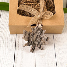 Load image into Gallery viewer, A maple leaf-shaped bark decoration placed next to a kraft gift box with rustic shredded paper, perfect for a natural touch.
