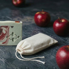 Load image into Gallery viewer, Apple shea butter artisan soap with cotton gift bag, showing a wrapped bar and matching drawstring pouch.