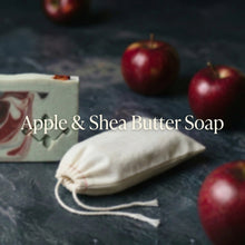 Load image into Gallery viewer, Apple shea butter artisan soap with cotton gift bag, showing a wrapped bar and matching drawstring pouch.