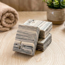 Load image into Gallery viewer, Three birch design handmade soap bars with gray-and-ivory birchwood stripes; front bar shows embossed Woods &amp; Mosses logo.