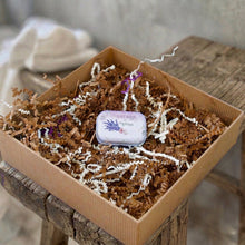 Load image into Gallery viewer, Lavender-pink tin decorated with lavender flowers.