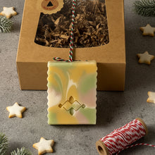 Load image into Gallery viewer, Pastel swirl handmade soap bar in soft yellow pink and green tones in front of box.