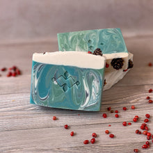 Charger l'image dans la galerie, Three blue and white marbled Christmas tree soap bars with pinecone and red peppercorn decorations