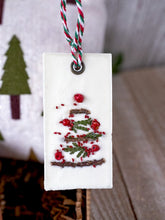 Load image into Gallery viewer, Holiday Self-Care Gift Box featuring a rectangular white wax tablet with organic decor.