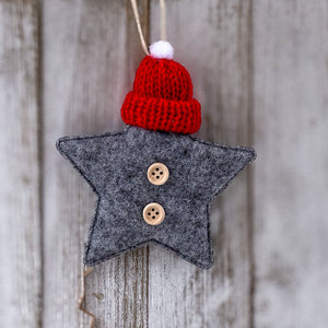 Holiday Self-Care Gift Box featuring a felt ornament pendant shaped like a star.