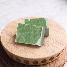 Charger l'image dans la galerie, Two green leaf pattern soap bars with white ends and handmade lace texture