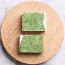Charger l'image dans la galerie, Two matching green lace leaf soap bars with white ends, shown as a handmade gift set