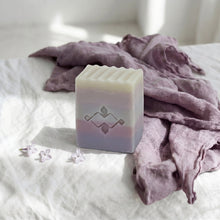 Load image into Gallery viewer, Cube lilac soap bar with ribbed top, pastel cream and mauve layers, and stamped logo