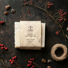 Load image into Gallery viewer, Artisan soap bar with 'Woods &amp; Mosses' packaging on a rustic surface with berries and twine.