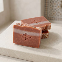 Load image into Gallery viewer, Moroccan clay soap bars with terracotta color, white stripe, stamped front, and speckled handmade texture