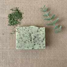Load image into Gallery viewer, Nettle &amp; Eucalyptus artisan soap bar, showing herbal speckles and handcrafted finish