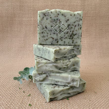 Load image into Gallery viewer, Stacked Nettle &amp; Eucalyptus artisan soap bars with a stamped top bar and visible herbal flecks