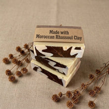 Load image into Gallery viewer, Three Moroccan Rhassoul clay soap bars stacked with an ingredient band label and oak leaf patterned faces.