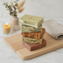 Load image into Gallery viewer, Stack of five artisan soap bars in earthy colors, handmade vegan soaps for face and body care gift set