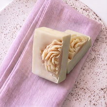 Load image into Gallery viewer, Pair of handmade floral soaps with raised peony designs and soft pastel ivory tones