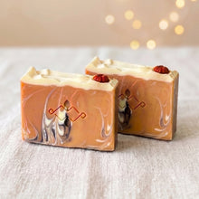 Load image into Gallery viewer, Pair of pumpkin artisan soap bars with orange marbled fronts, cream tops, stamped detail, and pumpkin accents