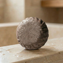 Load image into Gallery viewer, Single round rosemary mint men's shampoo bar standing upright - Woods and Mosses.