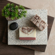 Load image into Gallery viewer, Top view of sandalwood natural soap bar with two matching artisan bars