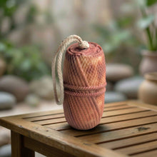 Load image into Gallery viewer, Textured sandalwood soap on a rope, handmade pink and cream body wash bar standing upright