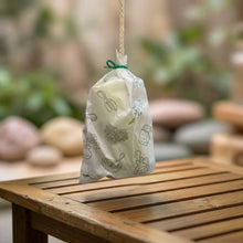 Load image into Gallery viewer, Wrapped sandalwood soap on a rope in eco paper, handmade long lasting wash bar