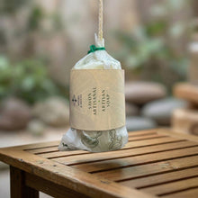 Load image into Gallery viewer, Wrapped sandalwood soap on a rope with Woods and Mosses branded sleeve, handmade artisan wash bar