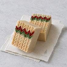 Charger l'image dans la galerie, Two handmade Christmas sweater soap bars in cream with red and green knit-style details