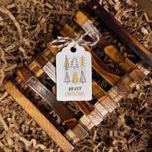 Load image into Gallery viewer, English Merry Christmas gift tag displayed on the brown wooden soap dish inside the kraft gift box.