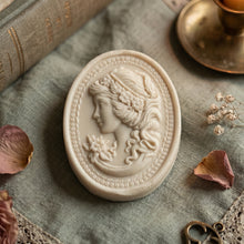 Load image into Gallery viewer, Handmade ivory oval cameo soap with raised woman portrait relief, vintage-style gift bar