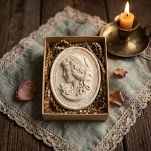 Load image into Gallery viewer, Ivory oval cameo soap in kraft box with raised portrait relief, handmade gift bar