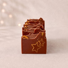 Charger l'image dans la galerie, Row of five Christmas Eve soap bars with gold stars and dried orange accents